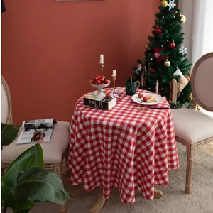 Red and white checkered round tablecloth for festive Christmas party and home dining decoration