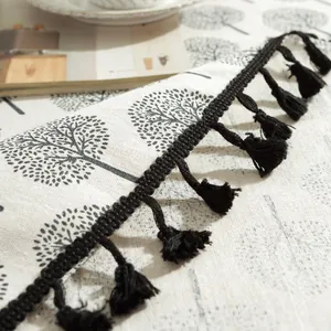 Linen table cloth with black tree patterns and stylish fringe edge for coffee tables