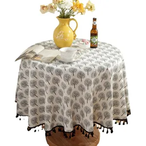 Mantel redondo de algodón y lino con estampado de árboles negros y flecos decor