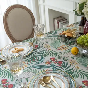 Vintage green plant printed linen tablecloth with elegant fringe for a rustic dining room decor