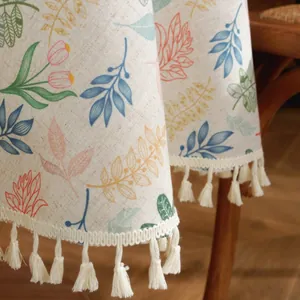 Linen table cloth with colorful leaf prints and white tassel edges for round tables