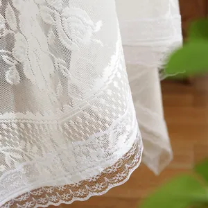 White French rococo lace tablecloth with intricate floral embroidery and scalloped edges