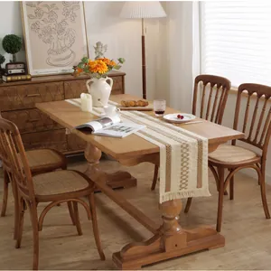 Beige cotton linen table runner with brown geometric stripes and decorative tassels