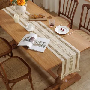 Boho cotton linen table runner with brown geometric patterns and tassel edges