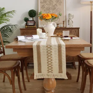 Rustic cotton linen table runner with geometric weave patterns and tassel fringe detail