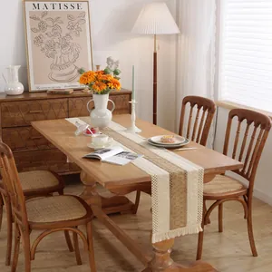 Nordic woven table runner with geometric stripes, tassels, and cotton linen texture