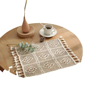 Bohemian style beige crochet table runner with tassels and hollow floral patterns