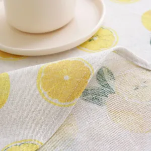 Linen cotton tablecloth with lemon print and fine edge stitching for home decor