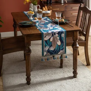 Chemin de table jacquard rétro bleu marine avec motifs floraux et pompons à franges