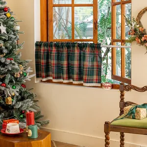 Christmas red and green plaid cafe curtain with lace trim on a cozy window setting