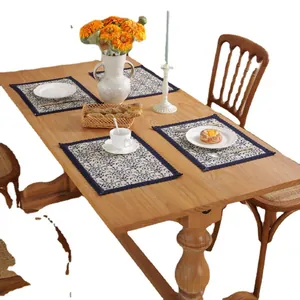 Set of 4 rectangular cotton linen placemats with vintage blue floral patterns and lace edges
