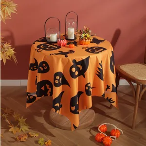 Halloween round tablecloth with orange pumpkin and ghost silhouettes for festive table decor