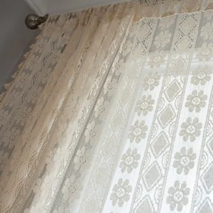 Beige floral lace curtain with bohemian geometric patterns and fringe tassels