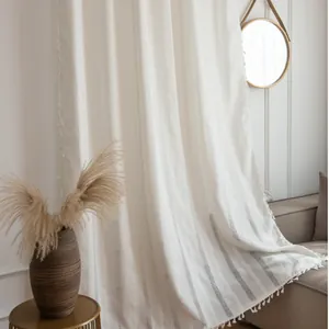 White linen curtain with geometric jacquard pattern and tassel trim for bedroom