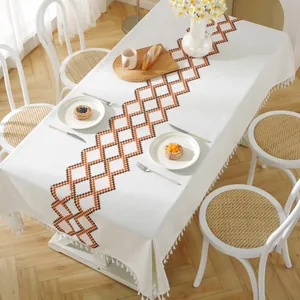 Waterproof rectangular tablecloth with embroidered geometric pattern and tassel fringe