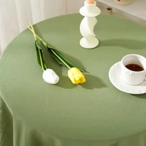 Minimalist sage green round tablecloth with textured cotton fabric for home dining decor