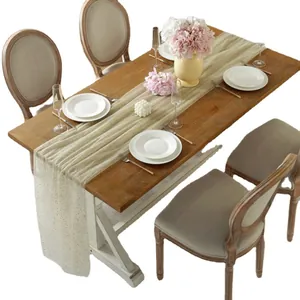 Sparkling gold sequin table runner on elegant mesh fabric for wedding dessert tables