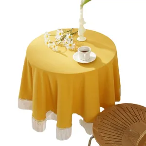 Elegant bright yellow round tablecloth with white pleated lace trim for home decor