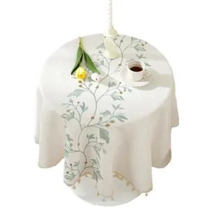 French embroidered round tablecloth with leaf pattern and elegant tassels