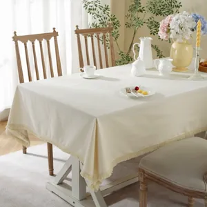 Rectangular cream linen tablecloth with fringed edges for home dining and picnic decor
