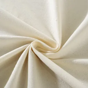 Macro shot of premium off-white linen fabric texture with heavy weave detail