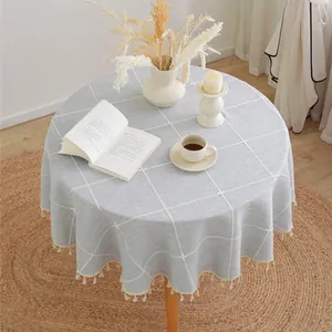 Round grey checkered tablecloth with decorative tassels for minimalist home dining decor