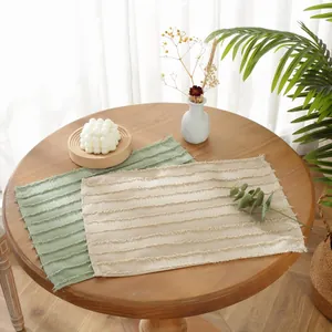 Rectangle striped woven table mats in light green and beige for home dining decor