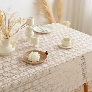 Elegant beige crochet lace tablecloth with hollow flower pattern and fringe tassels