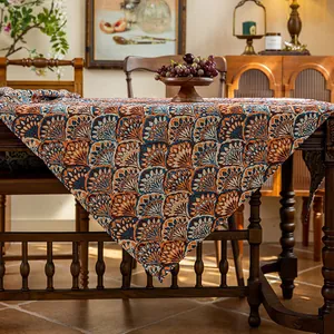 Detail of bohemian jacquard tablecloth showing thick woven texture and teal pattern