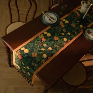 Retro tafelloper met citroenmotief, donkerblauwe jacquard stof en bruine kwastjes