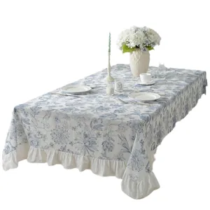 Blue and white floral cotton tablecloth with ruffled edges for elegant home dining decor