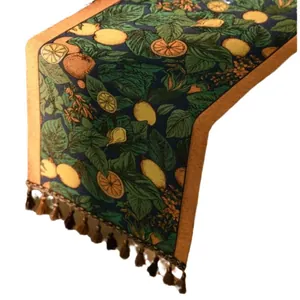 Runner da tavola vintage con stampe di limoni e arance e dettagli di nappe