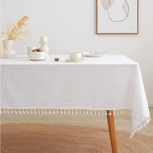 White minimalist cotton tablecloth with tassel edges for home and studio background