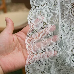White rose lace table runner with intricate floral embroidery for wedding decoration