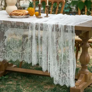 French vintage white lace tablecloth with floral patterns and delicate eyelash fringe edges