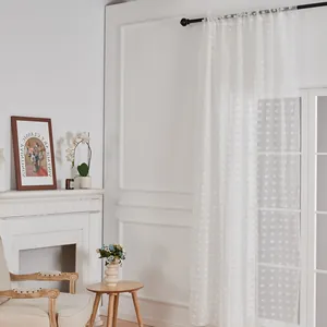White pom-pom sheer curtains with rod pocket design for elegant living room decor