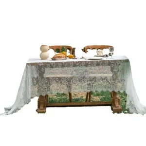 White French vintage lace tablecloth with floral embroidery and wavy scalloped edges