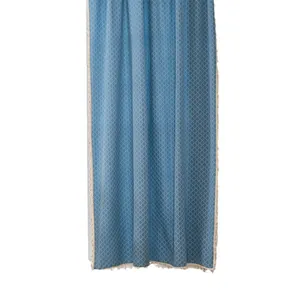 Blauer Verdunkelungsvorhang mit Jacquard-Rautenmuster und dekorativen Quasten