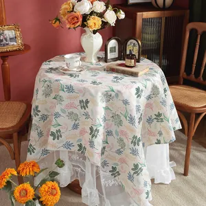 Pastel leaf print cotton linen round tablecloth with elegant lace ruffle hem details