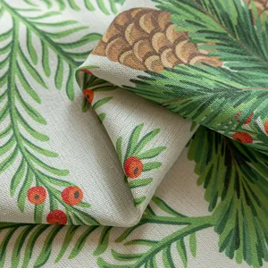 Detail shot of vintage geometric floral fabric with linen texture and pinecone patterns