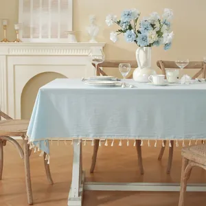 Light blue rectangular cotton linen tablecloth with elegant fringe trim for home decor