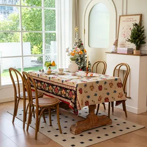 Detailed close-up of thickened Christmas tablecloth with jacquard floral festive patterns