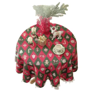 Red Christmas jacquard round tablecloth with fringes featuring nutcracker and Santa patterns