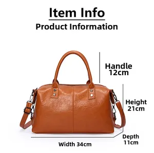 Maßangaben für eine braune Leder-Handtasche im Retro-Stil mit einer Breite von 34 cm und Höhe 21 cm
