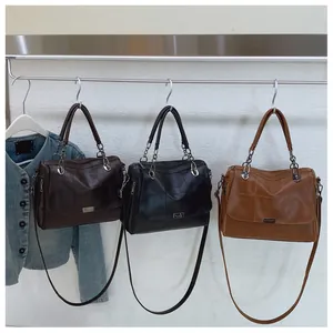 Vintage Boston handbag in three colors featuring soft leather and diamond quilted pattern
