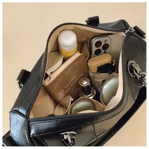 Classic black vintage Boston bag with large capacity and organized internal pockets