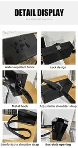 Detail view of water-resistant black box bag with metal lock and adjustable shoulder strap