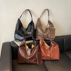 Large capacity PU leather tote bags in four colors with matching mini coin pouches