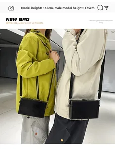 Fashionable box bag shown on 165cm and 175cm models to illustrate size and fit