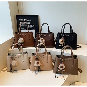 Litchi texture crossbody bags in six colors with detachable straps and cute charms